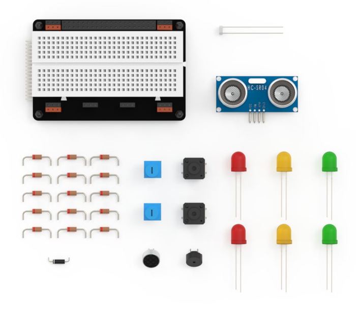 Inventor's Kit components: breadboard, ultrasonic sensor, LEDs, resistors, buttons, buzzer